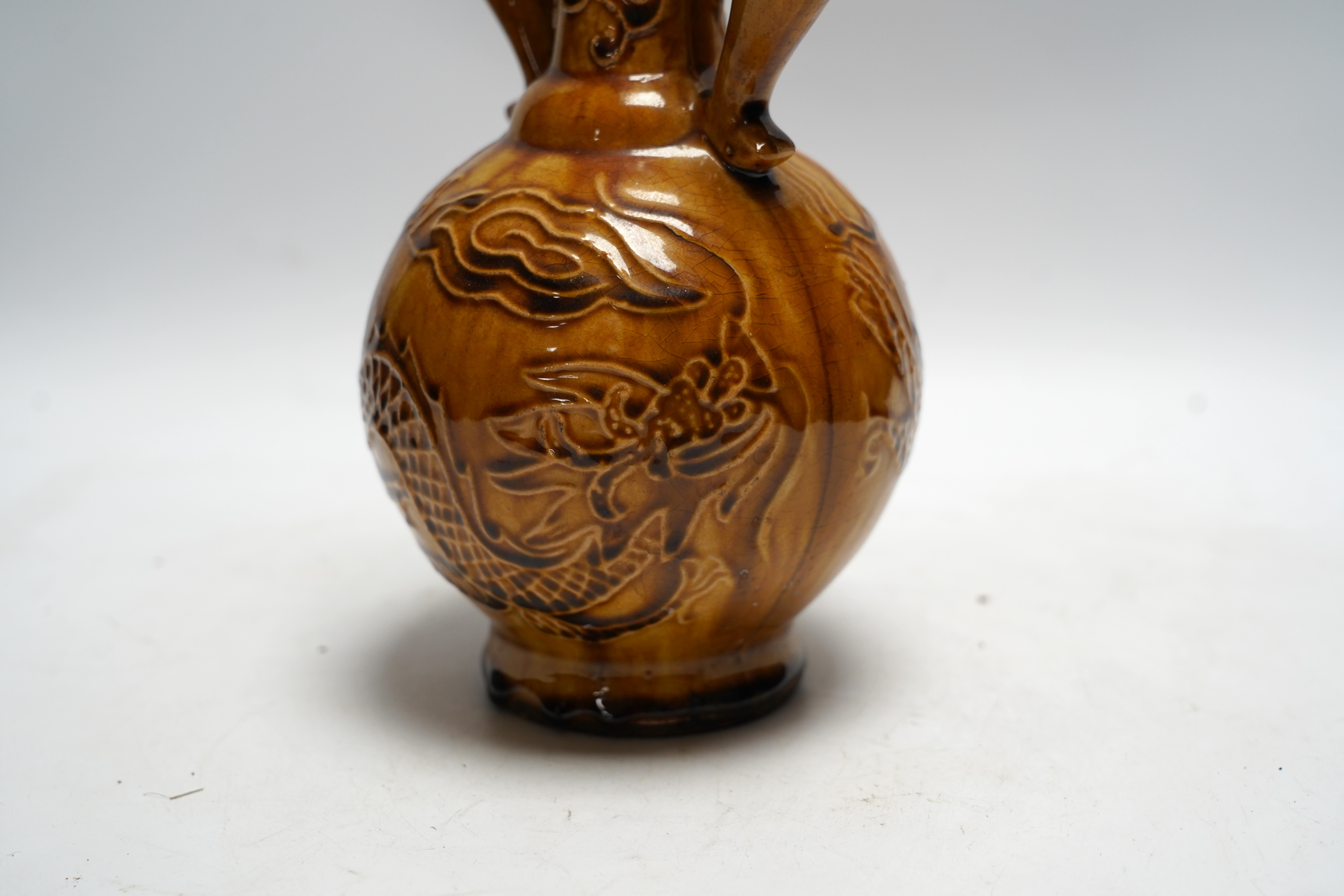 An 18th century style Chinese ochre glazed vase, 22.5cm